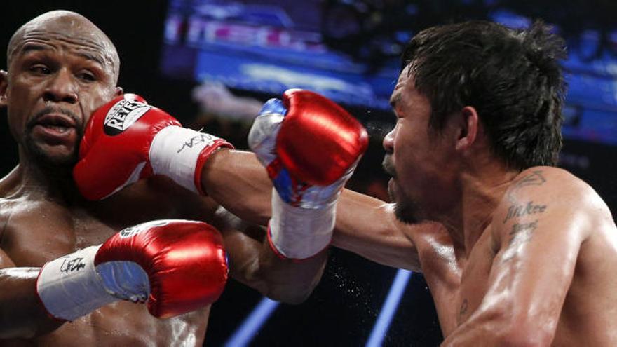 Floyd Mayweather y Manny Pacquiao, en su combate de 2015 en Las Vegas