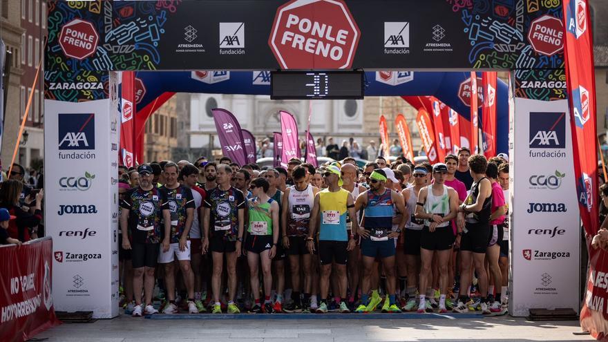 En imágenes | La carrera Ponle Freno saca a la calle a miles de personas en Zaragoza