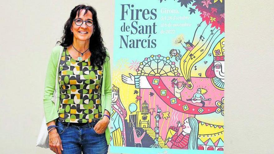 Teresa Calbó al costat del seu cartell el dia de la seva presentació. | ANIOL RESCLOSA