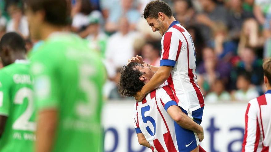 Los &#039;colchoneros&#039; celebran uno de los goles.