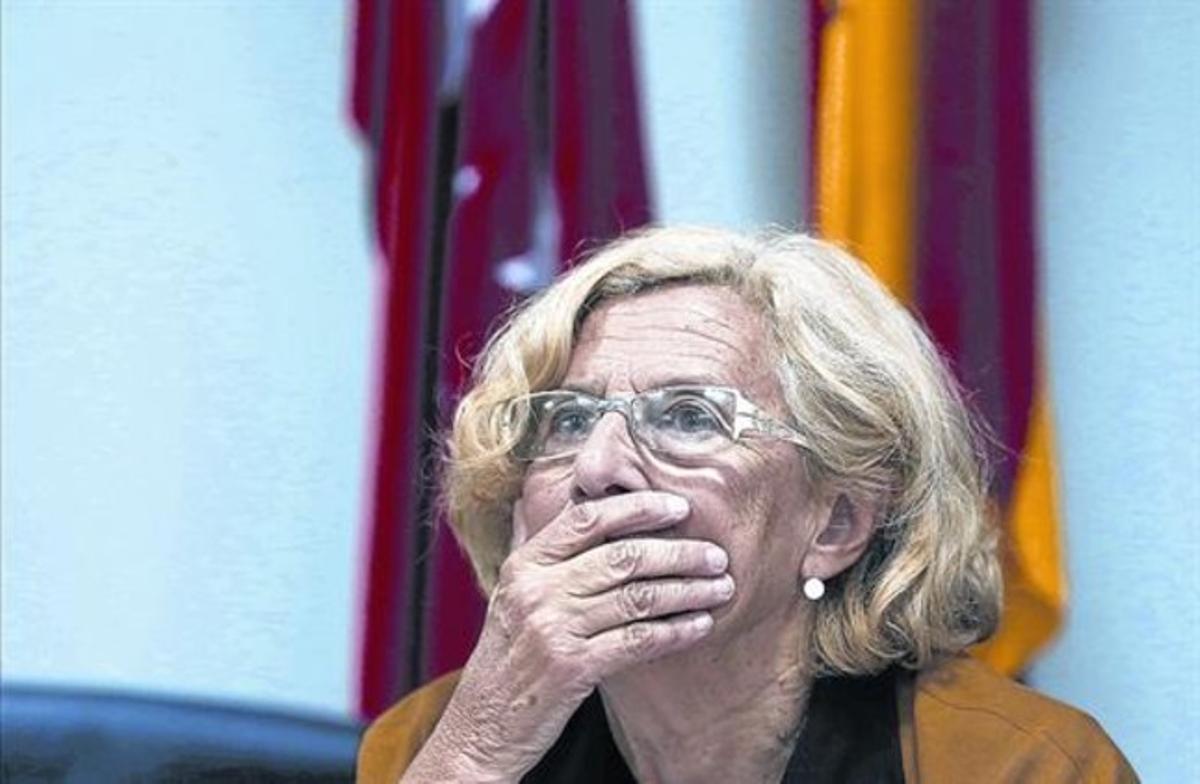 Manuela Carmena, ahir, durant la roda de premsa que va oferir a Madrid. Manuela Carmena, ahir, durant la roda de premsa que va oferir a Madrid.