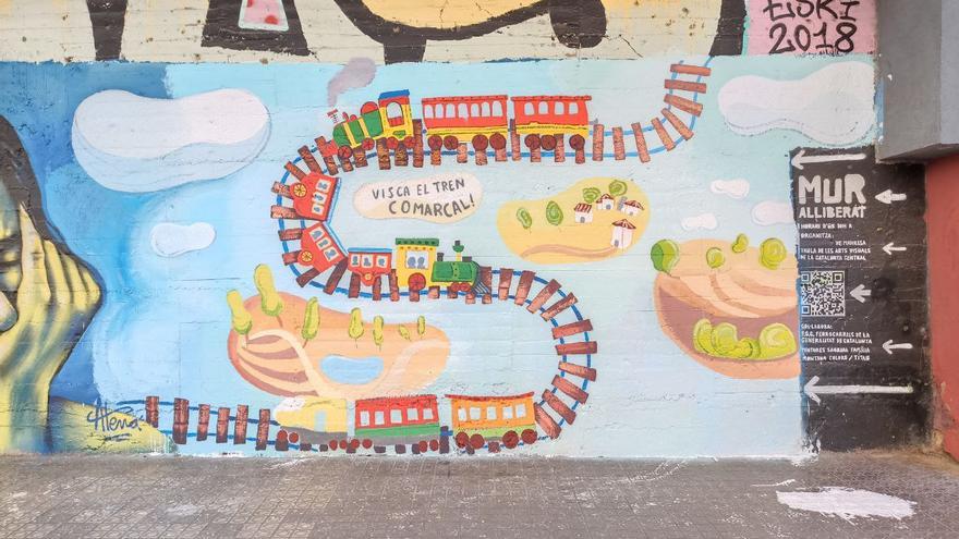 Fem Manresa pinta un mural per reivindicar el tren comarcal