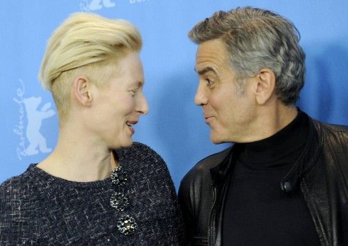 Actors Clooney and Swinton pose during photocall at 66th Berlinale International Film Festival in Berlin