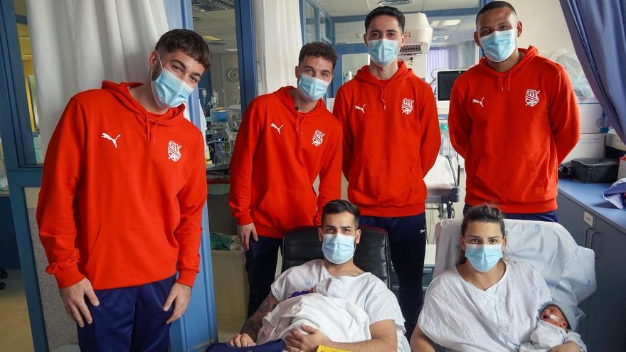 Els quatre representants de la plantilla durant una de les visites