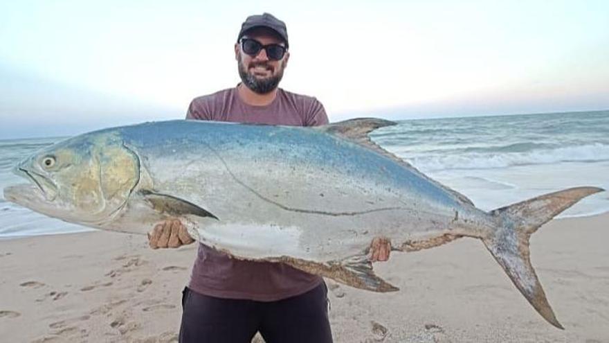 El pescador y el ejemplar capturado