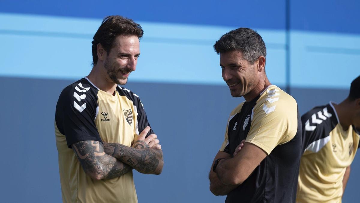 Calero junto a Funes en su primer entrenamiento con el Málaga CF