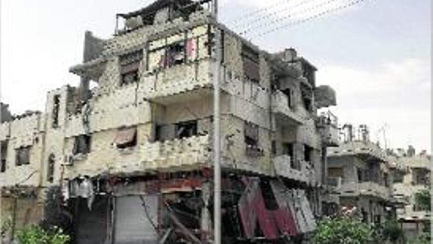 Imatge d&#039;un edifici molt malmès a Homs.