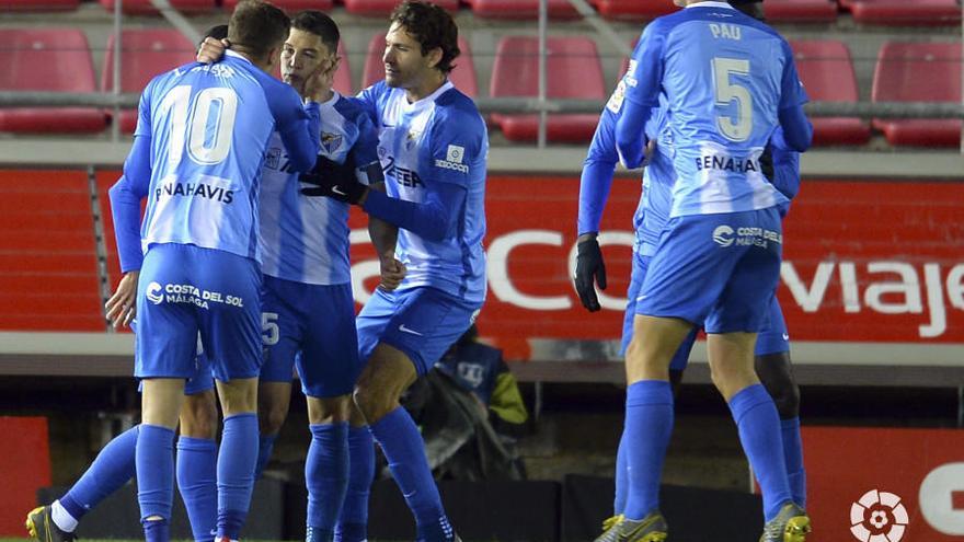 Los jugadores del Málaga CF celebran un gol. El equipo blanquiazul llega en plena racha a esta fase decisiva de la temporada.