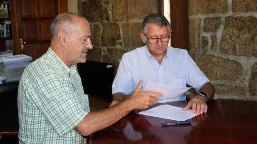 Soto y Cuíña, durante la firma del convenio.