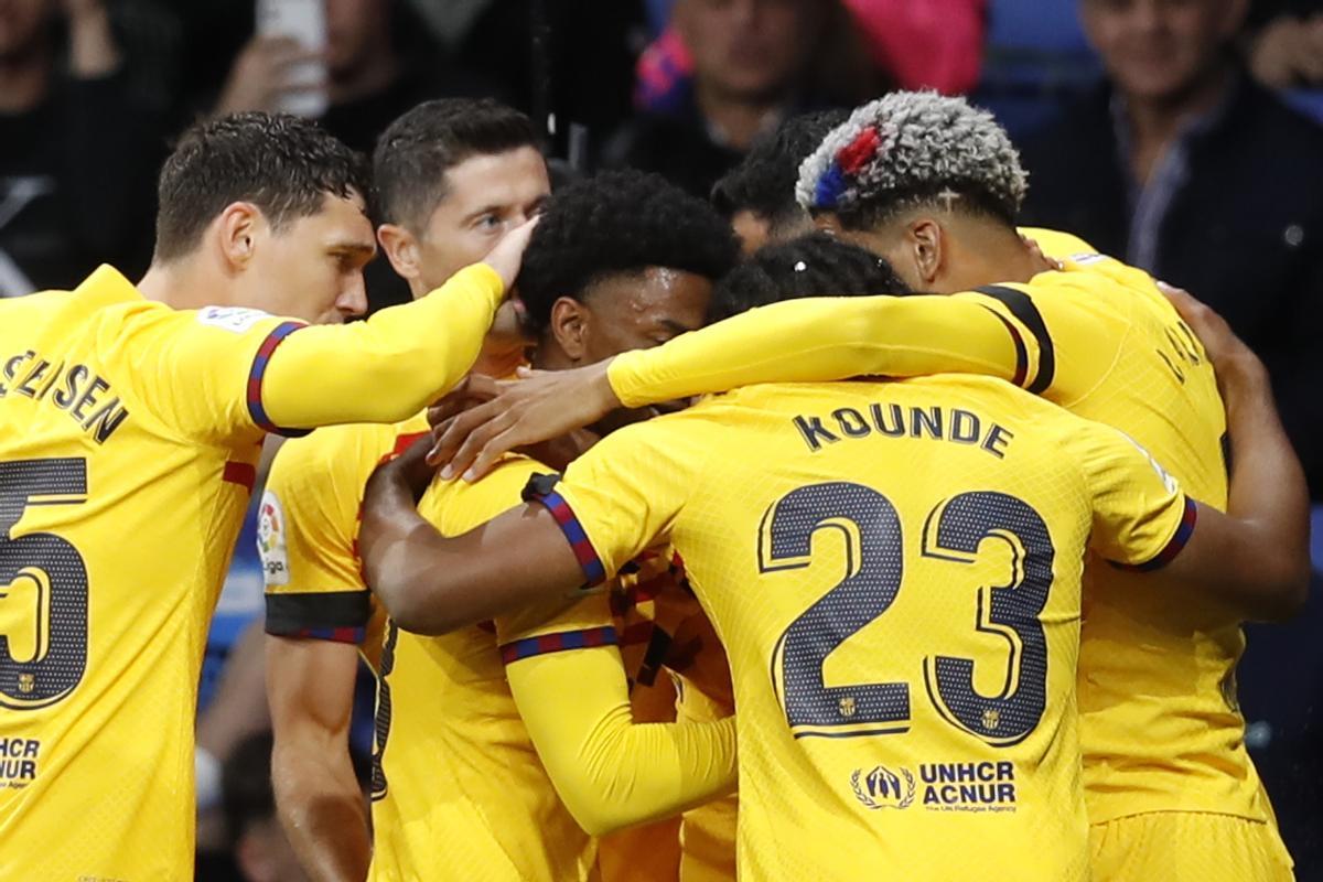 Barcelona’s defender Alejandro Balde (C) celebrates with his teammates after scoring the 0-2 during the Spanish LaLiga soccer match between RCD Espanyol and FC Barcelona at RCDE Stadium in Barcelona, Catalonia, Spain, 14 May 2023. EFE/ Andreu Dalmau