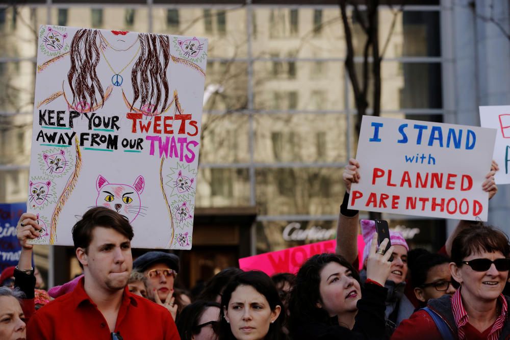 Demonstrators take part in a 'Day Without a ...