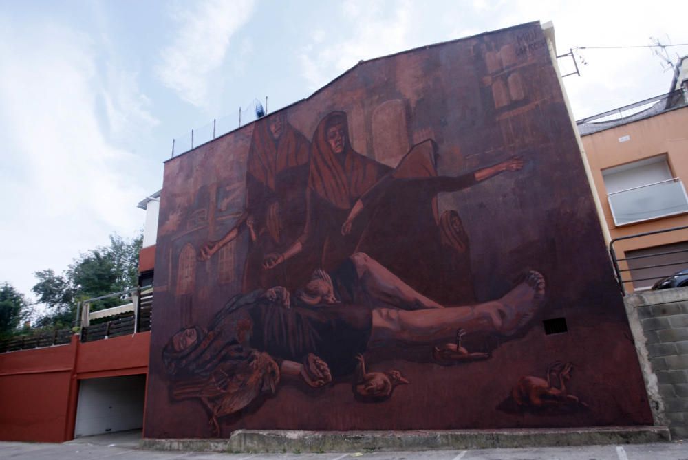 Mural de Milu Correch a l'aparcament del restaurant Can Roca al barri de Taialà