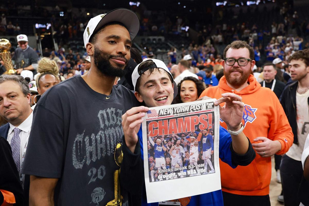 SAN ANTONIO, TEXAS - JUNE 13: Timothée Chalamet celebrates with Mikal Bridges #25 of the New York Knicks after the victory against the San Antonio Spurs in Game Five of the 2026 NBA Finals at Frost Bank Center on June 13, 2026 in San Antonio, Texas. NOTE TO USER: User expressly acknowledges and agrees that, by downloading and or using this photograph, User is consenting to the terms and conditions of the Getty Images License Agreement. Gregory Shamus/Getty Images/AFP (Photo by Gregory Shamus / GETTY IMAGES NORTH AMERICA / Getty Images via AFP). NOTE TO USER: User expressly acknowledges and agrees that, by downloading and or using this photograph, User is consenting to the terms and conditions of the Getty Images License Agreement