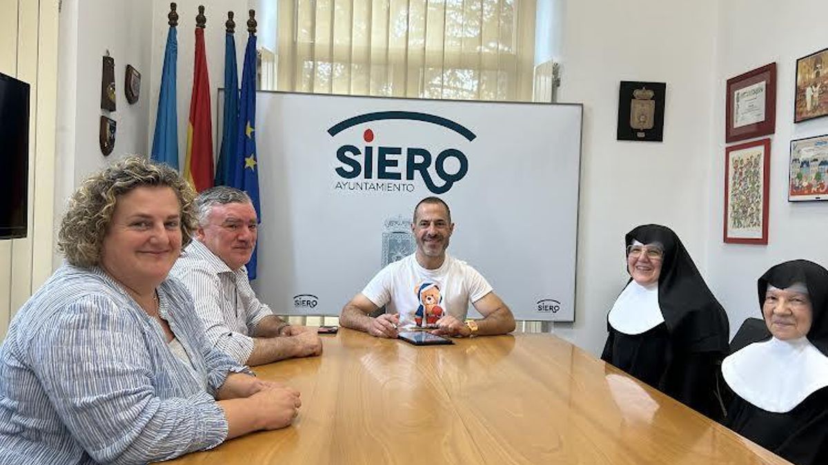 La firma del comvenio.
