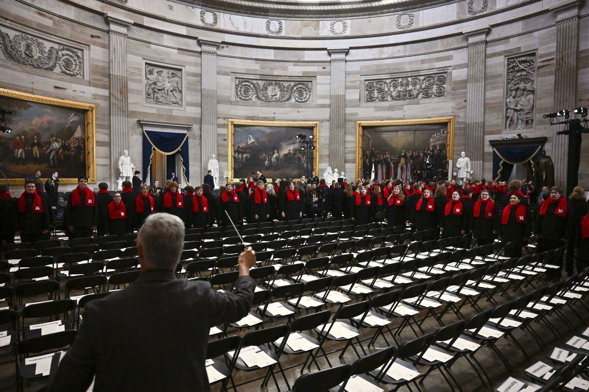 Choir students from the University of Nebraska-Lincoln practice before the 60th Presidential Inauguration in the Rotunda of the U.S. Capitol in Washington, Monday, Jan. 20, 2025. (Ricky Carioti/The Washington Post via AP, Pool). POOL IMAGE