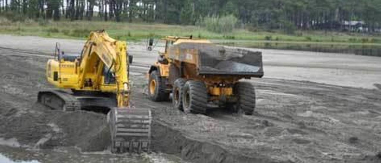 Trabajos en la Poza de Navia, el pasado verano.