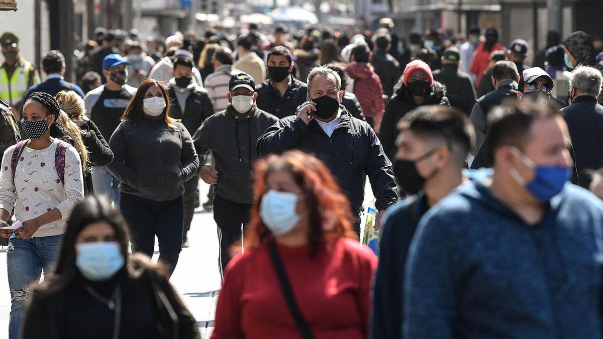 Personas con mascarilla