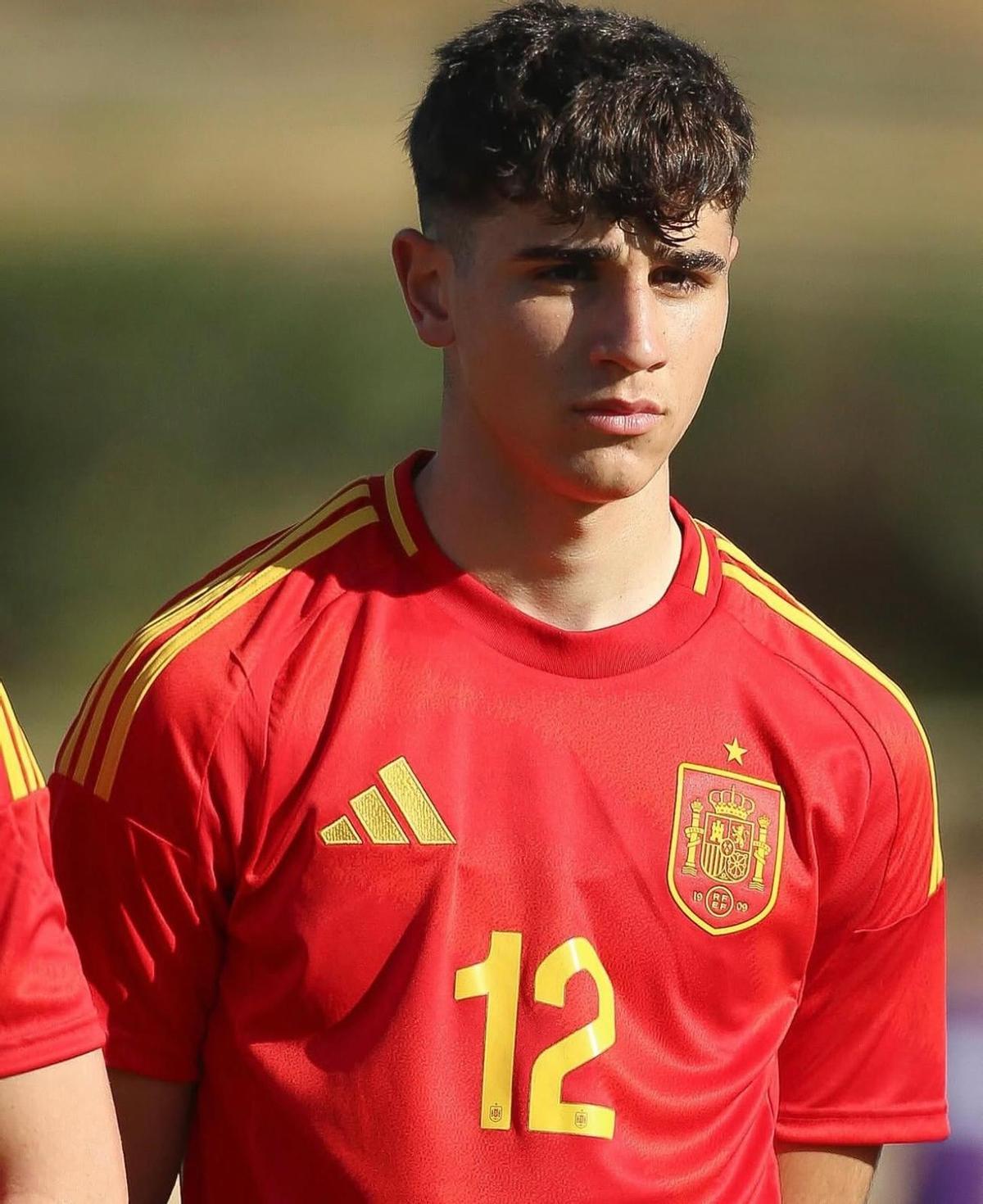Nacho, con las inferiores de España.