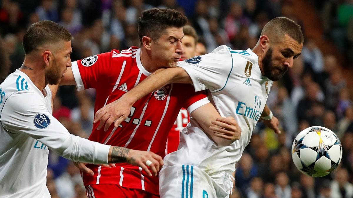Robert Lewandowski, junto a Karim Benzema