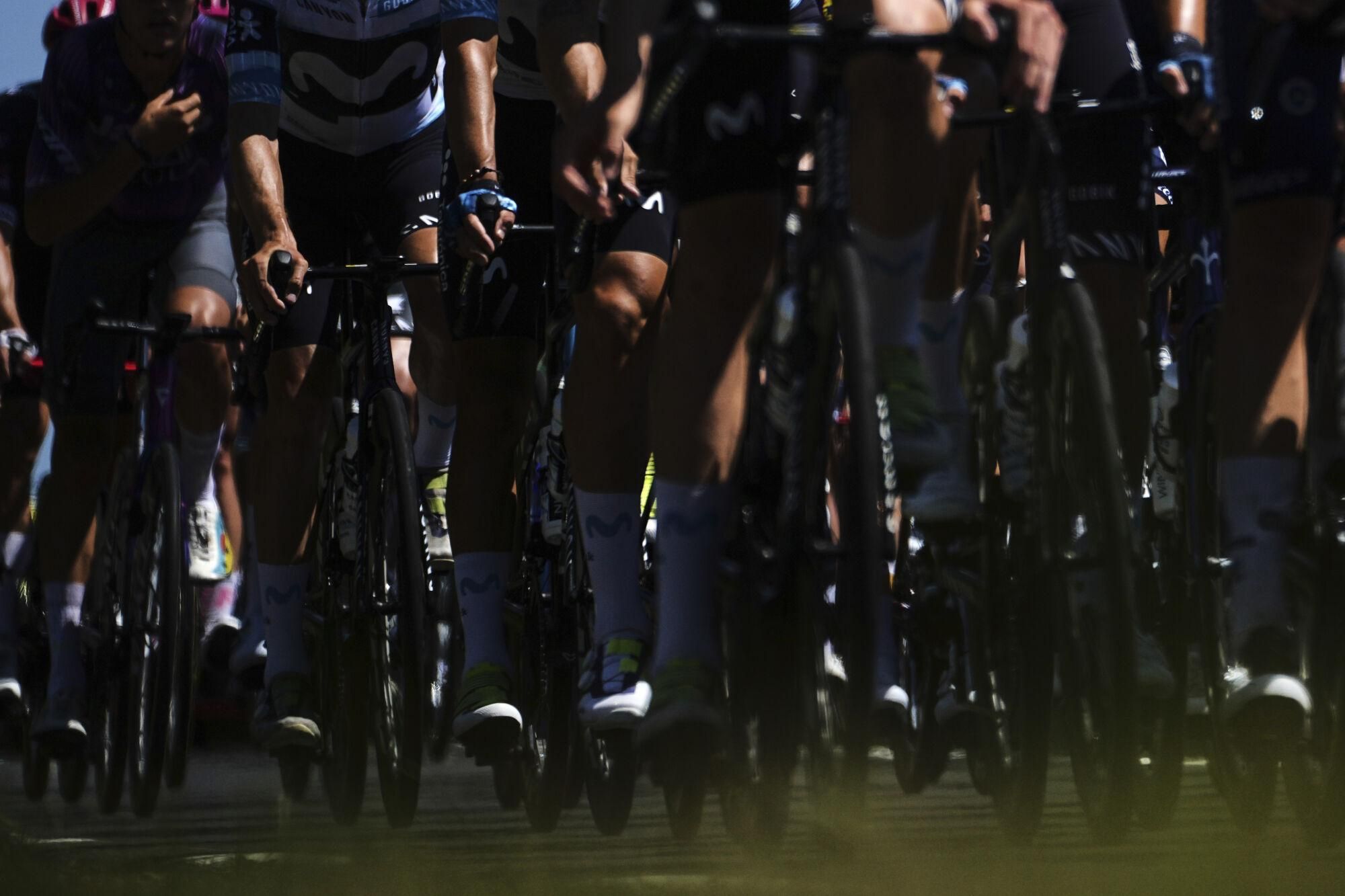 The pack rides during the sixth stage of the Tour de France cycling race over 201.5 kilometers (125.2 miles) with start in Bayeux and finish in Vire Normandy, France, Thursday, July 10, 2025. (AP Photo/Thibault Camus)