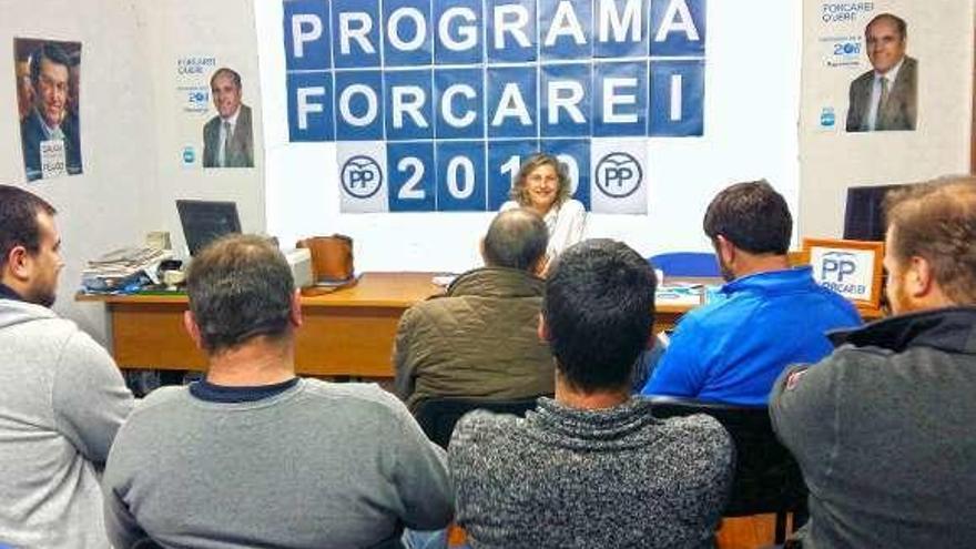 Cachafeiro y otros populares, reunidos para elaborar el programa.