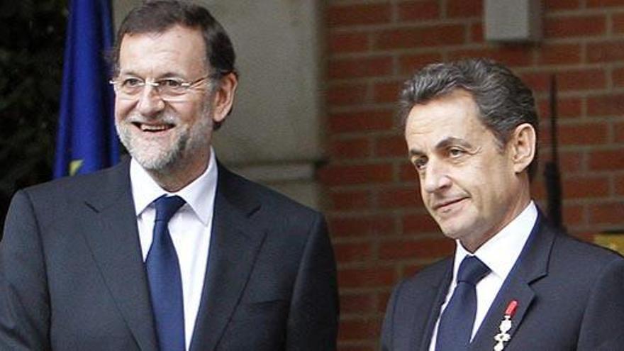 Mariano Rajoy, junto a Nicolas Sarkozy, este lunes.