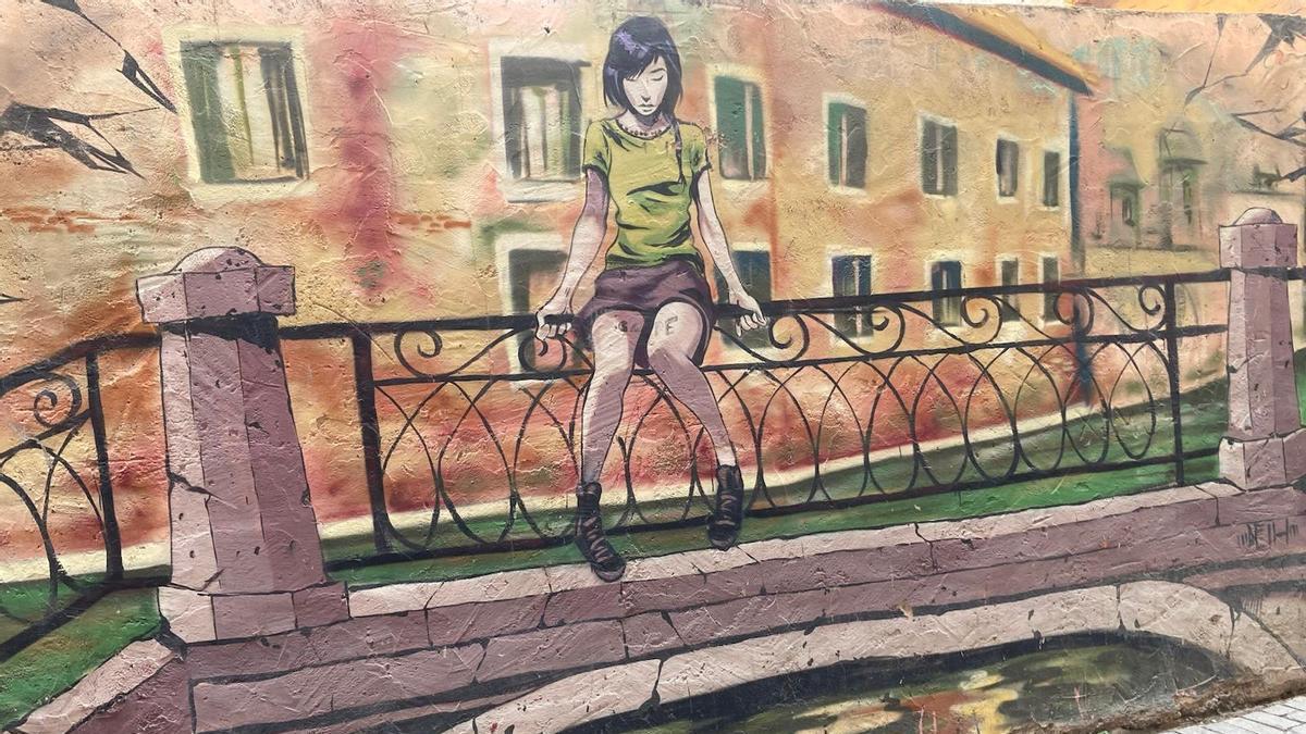 Detalle del grafiti en la calle Moret