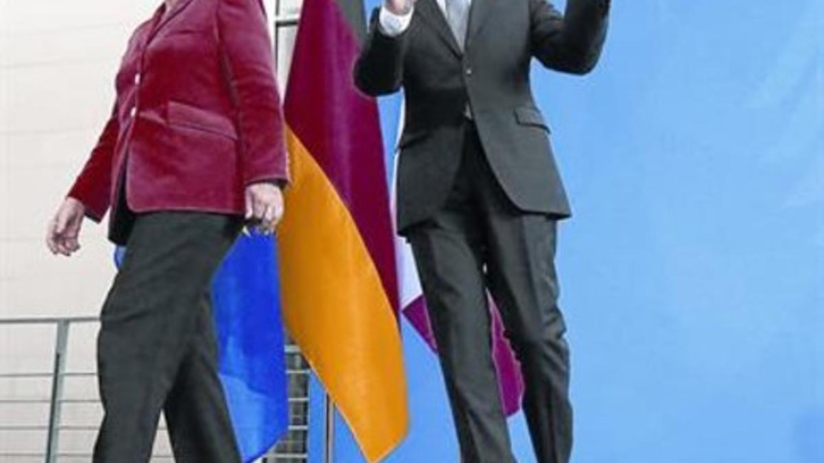 Merkel y Valls, ayer tras su rueda de prensa conjunta en Berlín.