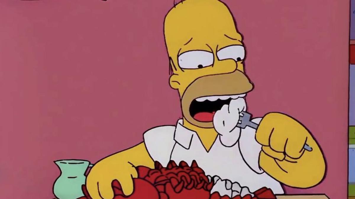 Homer comiéndose a su mascota Tenacitas.