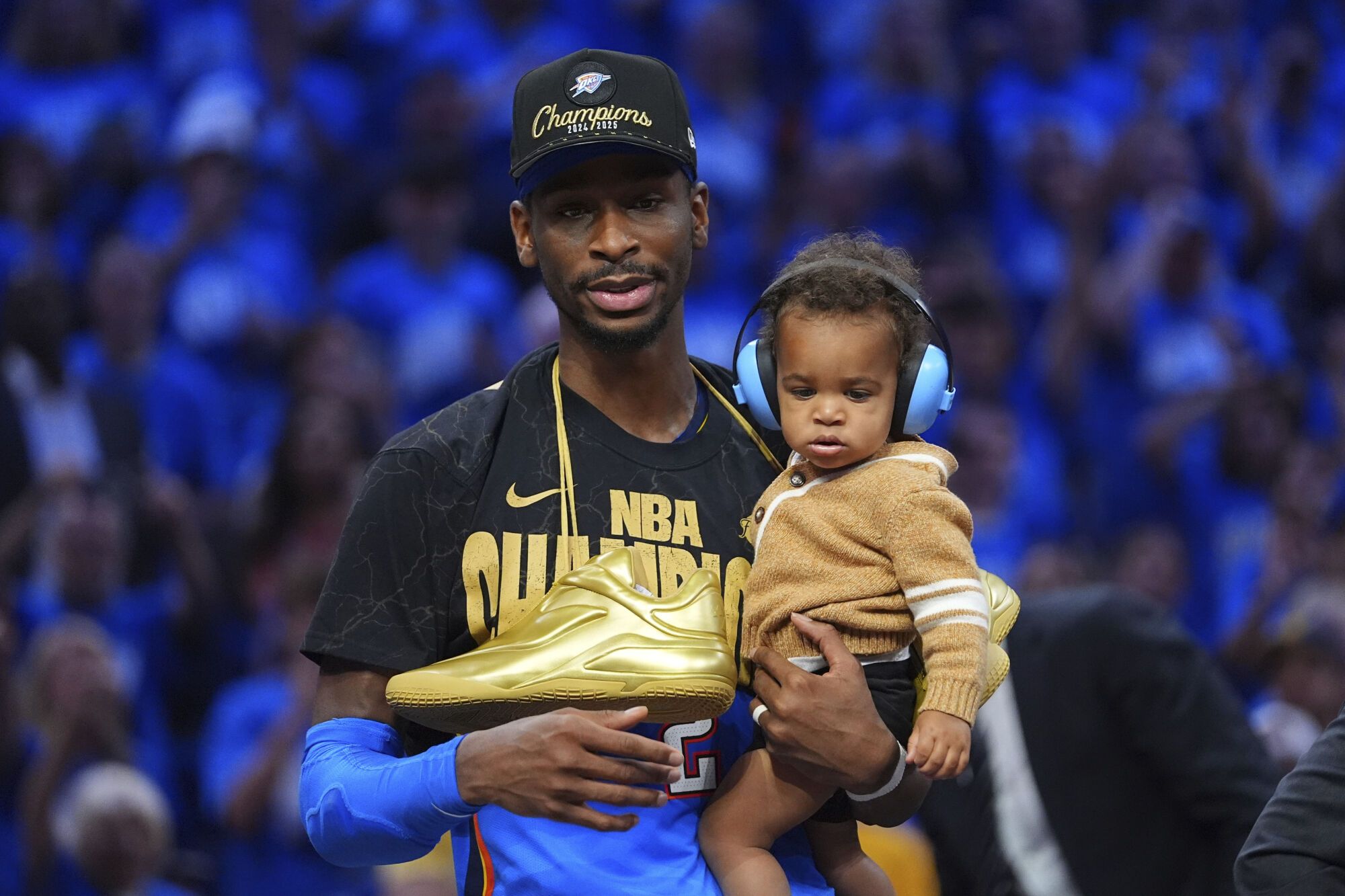 Oklahoma City Thunder guard Shai Gilgeous-Alexander celebrates after they won the NBA basketball championship with a Game 7 victory against the Indiana Pacers Sunday, June 22, 2025, in Oklahoma City. (AP Photo/Julio Cortez)