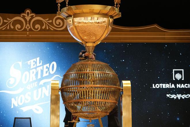 Staff prepare numbered lottery balls before the start of Spains bumper Christmas lottery draw, known as El Gordo, or The Fat One, at Madrids Teatro Real, Spain, Sunday, Dec. 22, 2024. (AP Photo/Bernat Armangue)