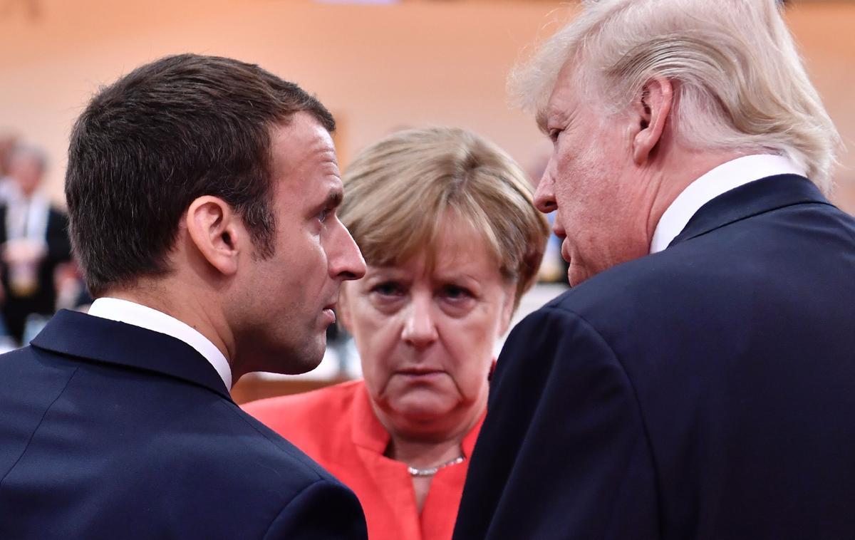 Emmanuel Macron, Angela Merkel y Donald Trump al inicio de la primera sesión de trabajo del G20 en Hamburgo, en julio del 2017.