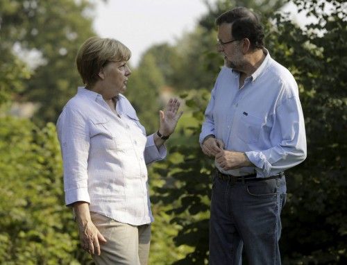 Rajoy y Merkel, de paseo por el Castillo de Meseberg