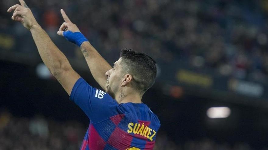 Luis Suárez celebra un gol contra el Mallorca en el Camp Nou