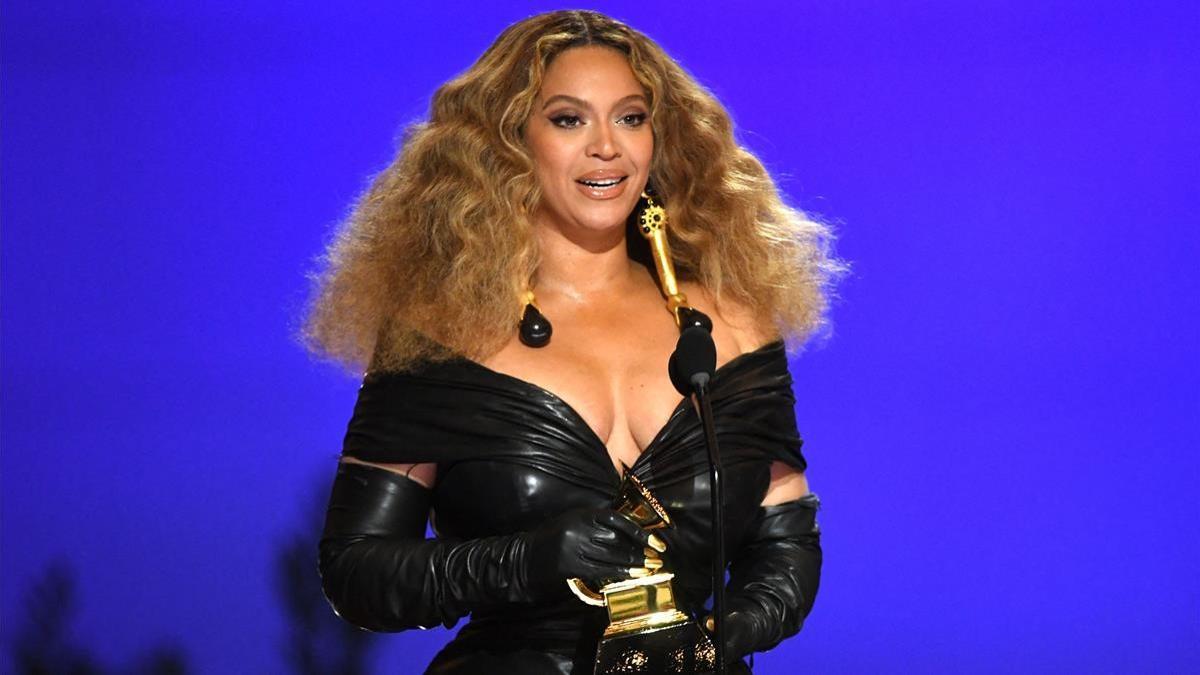 TOPSHOT - LOS ANGELES  CALIFORNIA - MARCH 14  Beyonce accepts the Best R B Performance award for  Black Parade  onstage during the 63rd Annual GRAMMY Awards at Los Angeles Convention Center on March 14  2021 in Los Angeles  California    Kevin Winter Getty Images for The Recording Academy AFP (Photo by KEVIN WINTER   GETTY IMAGES NORTH AMERICA   Getty Images via AFP)