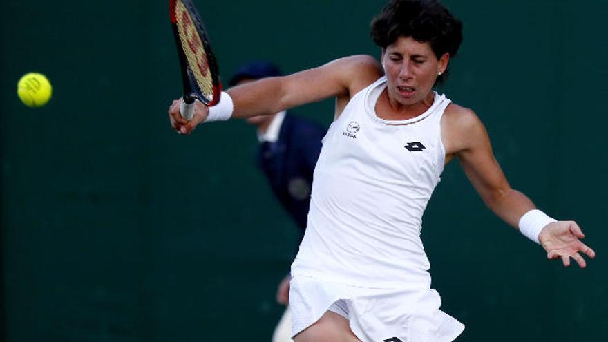 Carla Suárez en su último partido en Wimbledon frente a la china Shuai Peng