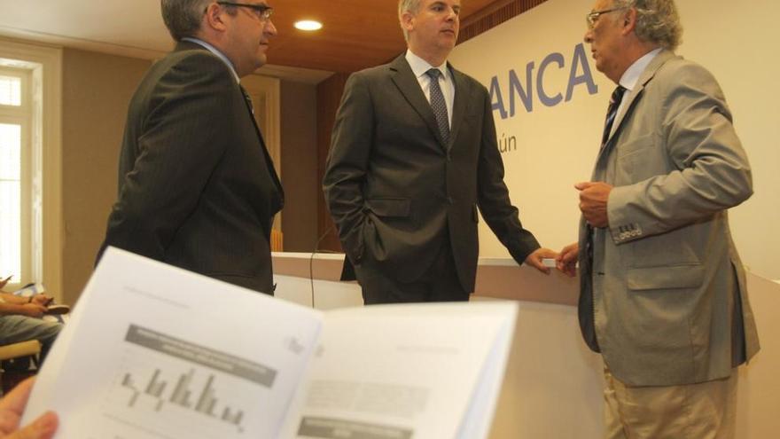 Patricio Sánchez, Santiago Lago y Fernando González, del Foro Económico de Galicia. Xoán Álvarez