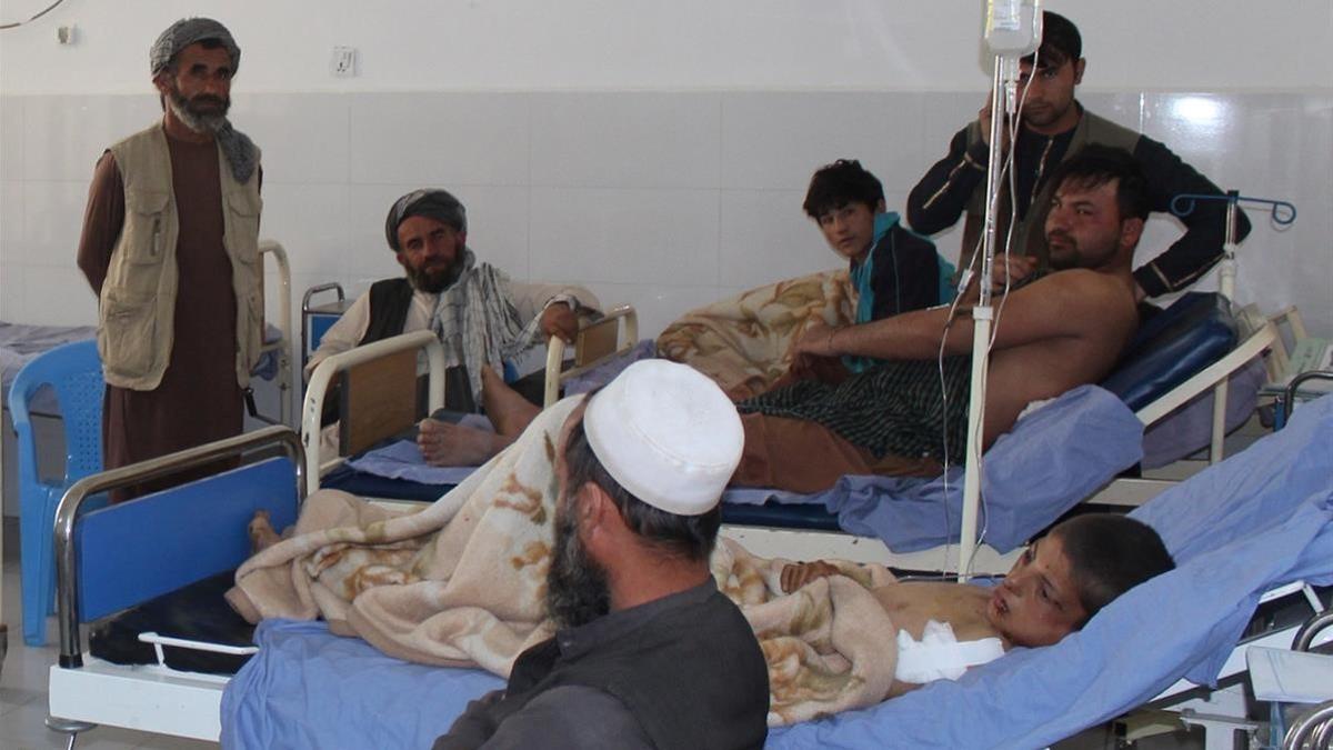 undefined42760052 afghans receive treatment at a hospital after monday s airst180403122413