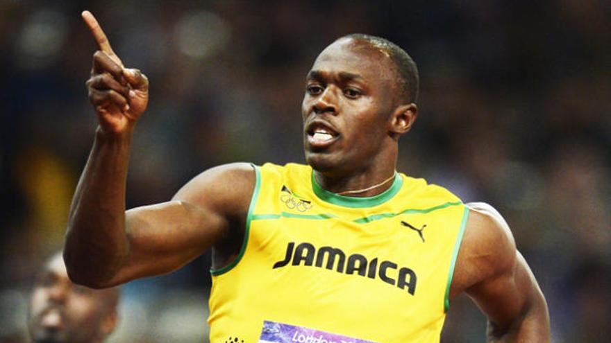 El jamaicano Usain Bolt celebra su victoria.