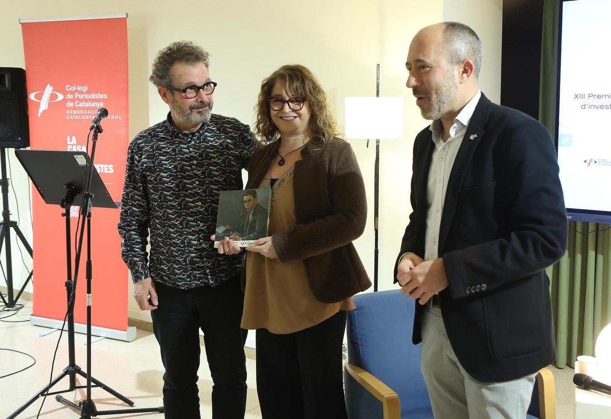 Mireia Prats i Joan Torrents van rebre el premi de mans de l'alcalde Marc Aloy