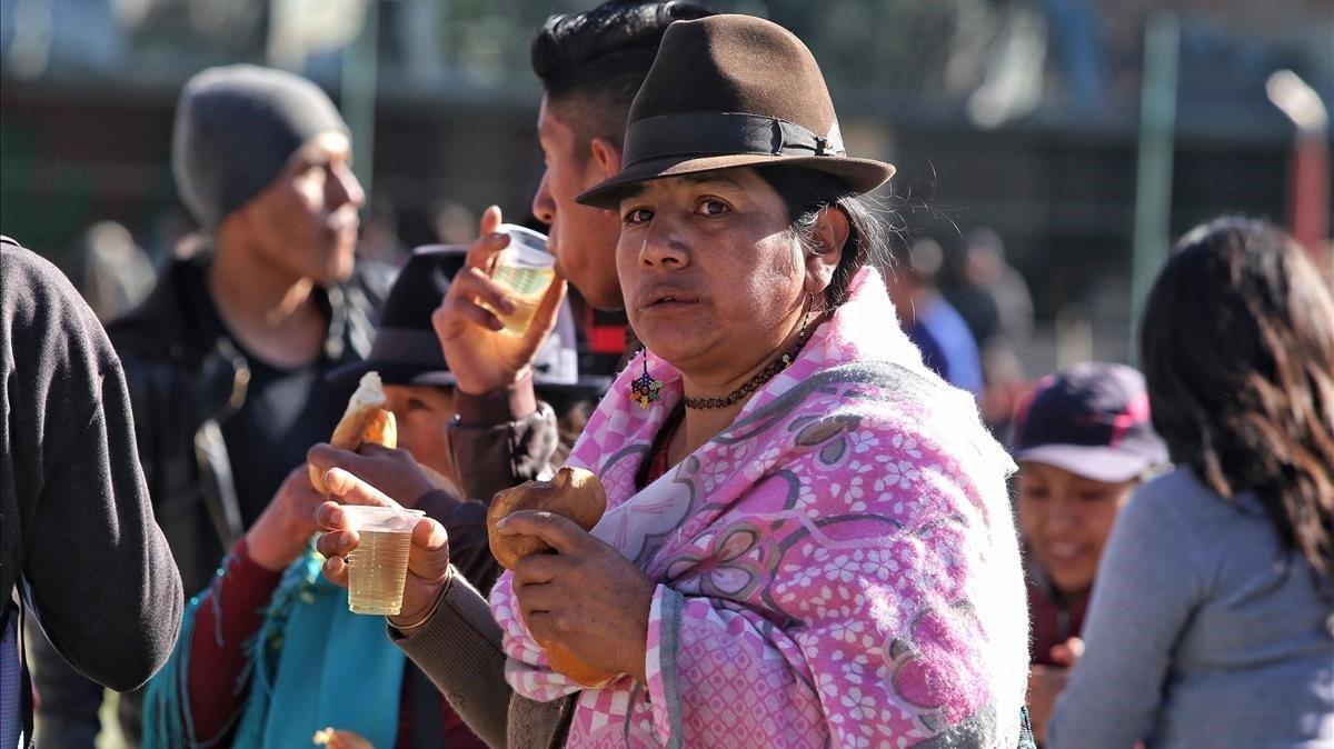 zentauroepp50319650 an indigenous woman has something for breakfast before mass 191009211534