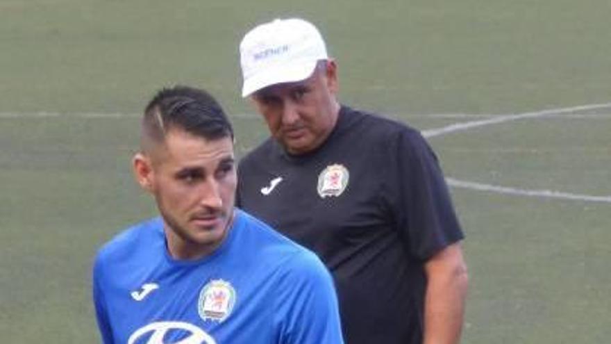 Rigo y el técnico Nico López.