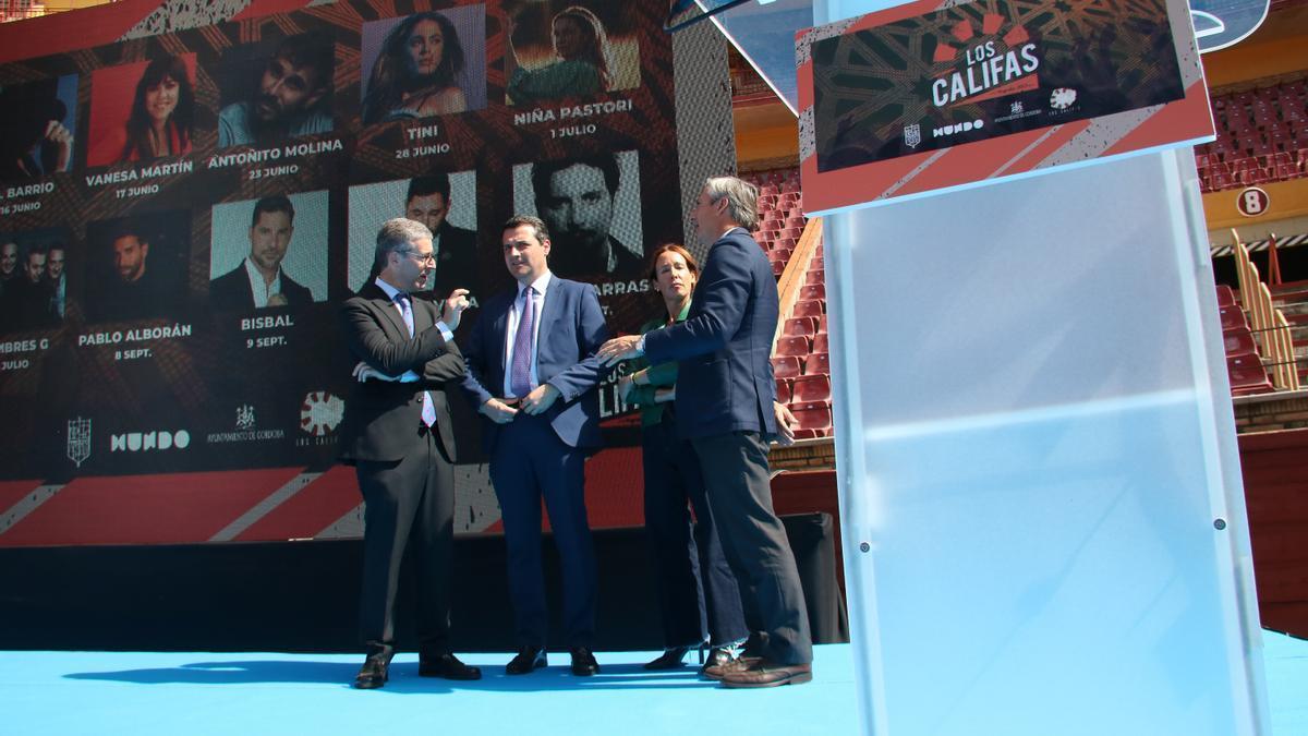 Daniel Rodríguez, José María Bellido, Marián Aguilar y Rafael Centeno, ante el cartel del Califa Fest.