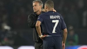 Luis Enrique y Kylian Mbappé, durante su etapa juntos en el PSG.