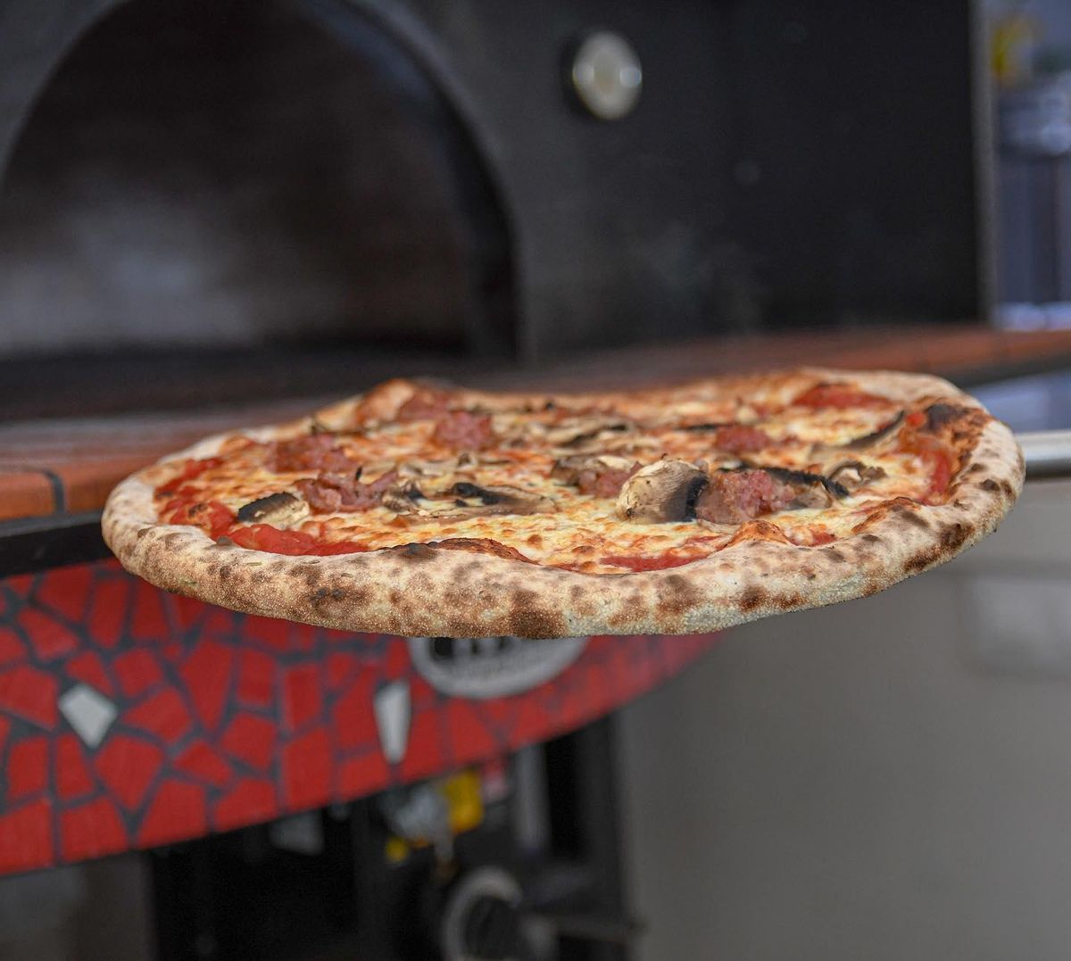 Pizza de Casa Mia.