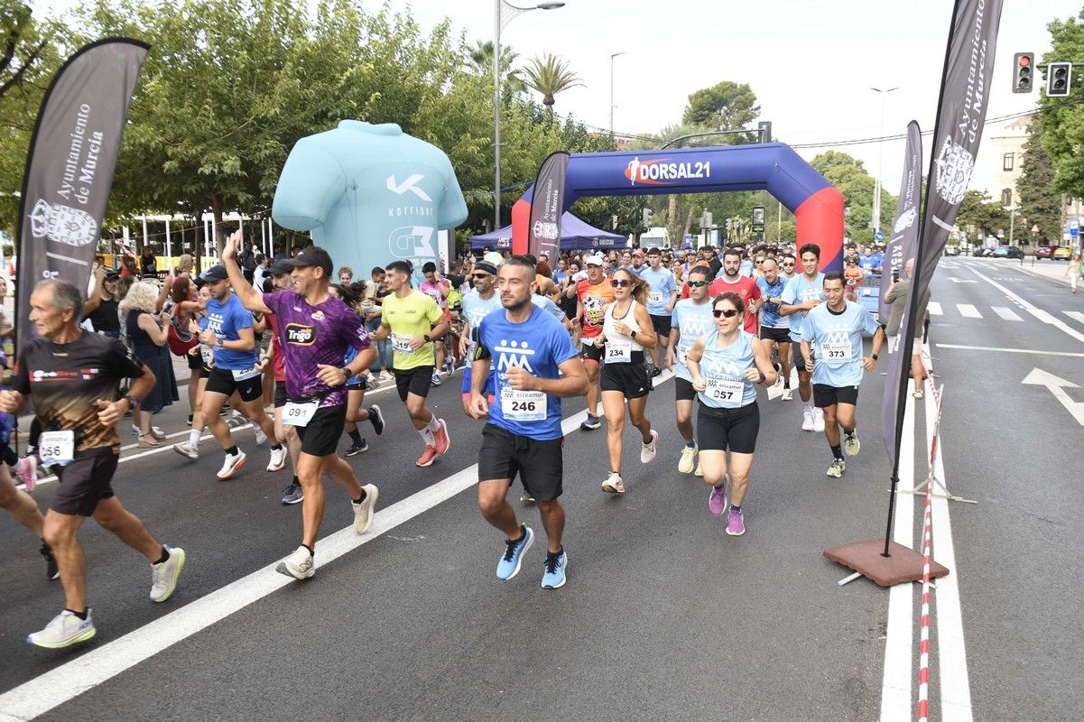 La carrera y marcha Solidaria Asteamur, en imágenes