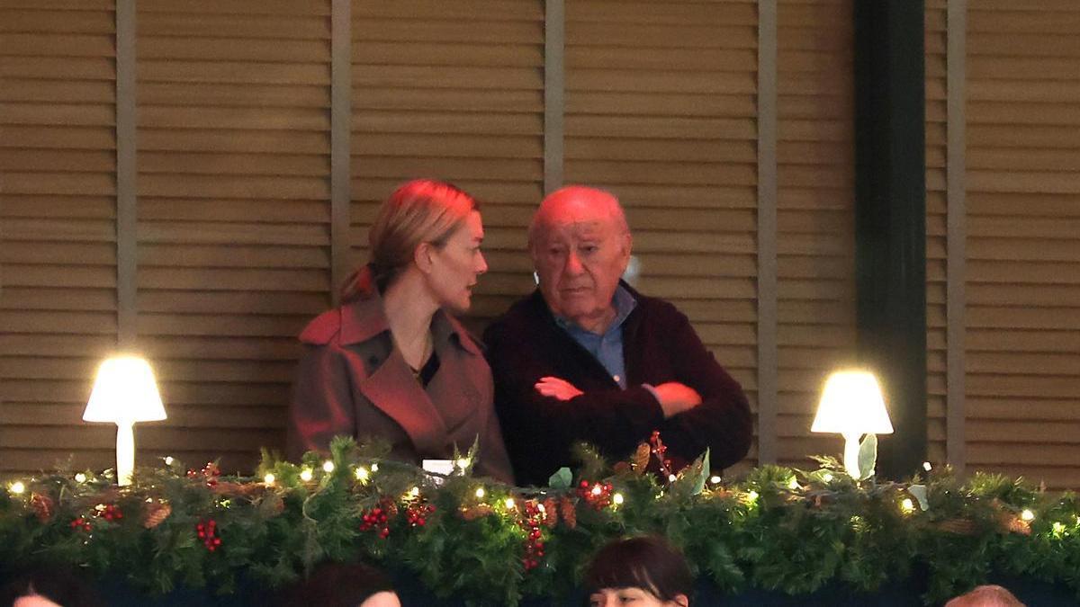 Amancio Ortega con su hija Marta.