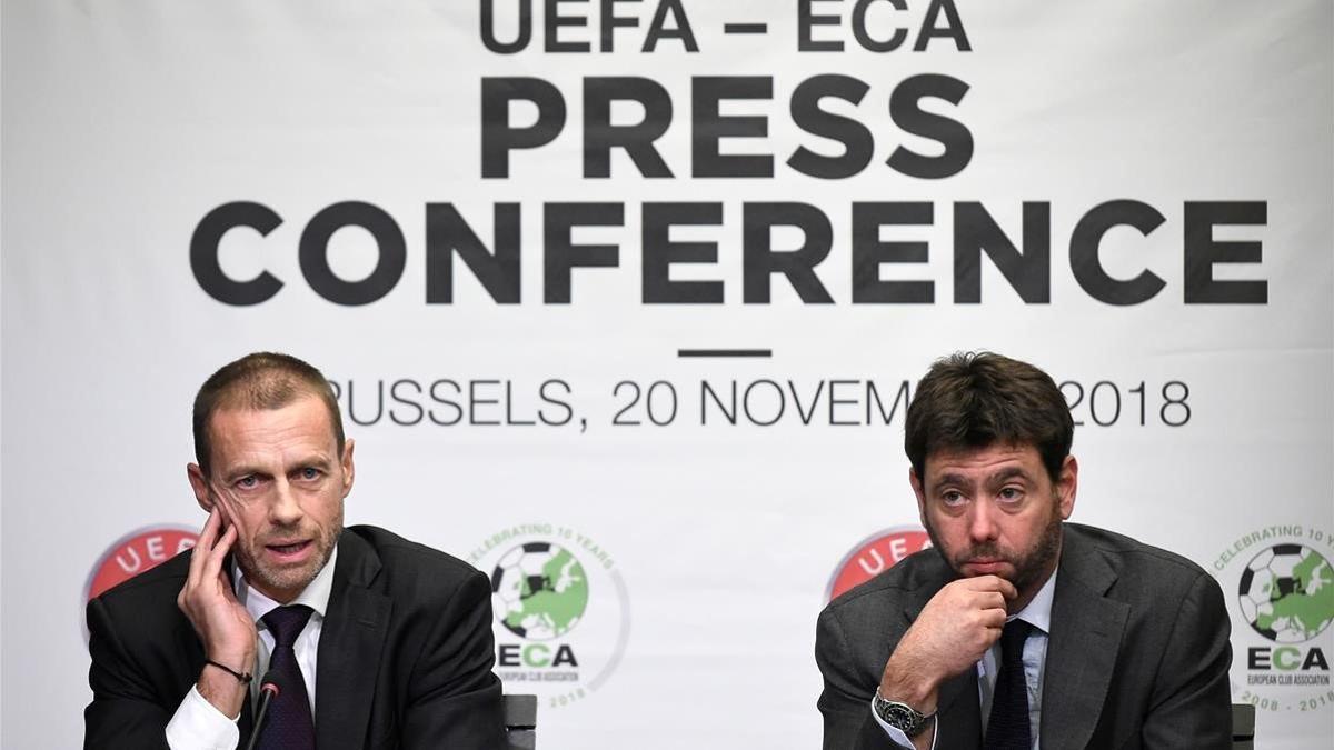 El presidente de la UEFA, Ceferin, y el de la ECA, Andrea Agnelli, en una reunión en Bruselas en 2018