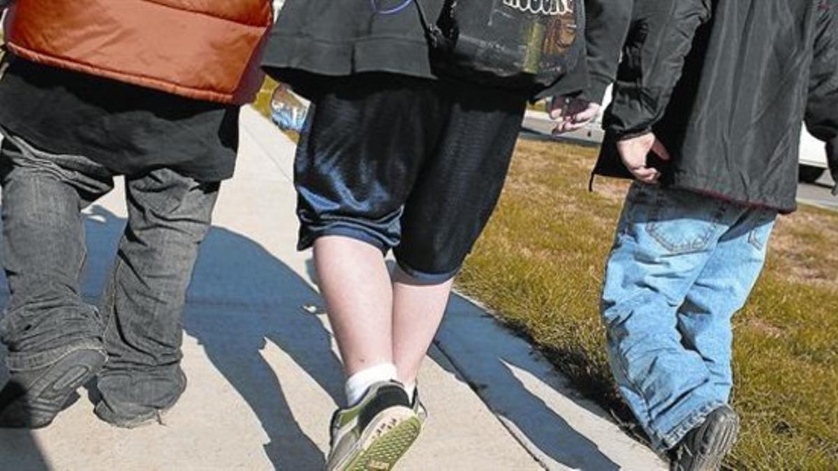 Tres participantes en un programa para menores obesos en Shapedown (EEUU).