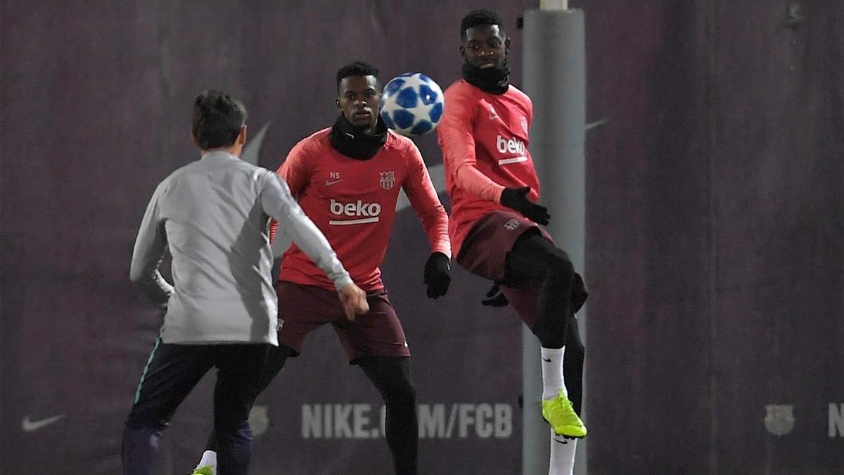 Semedo y Dembélé, en el entrenamiento previo al duelo con el Tottenham.